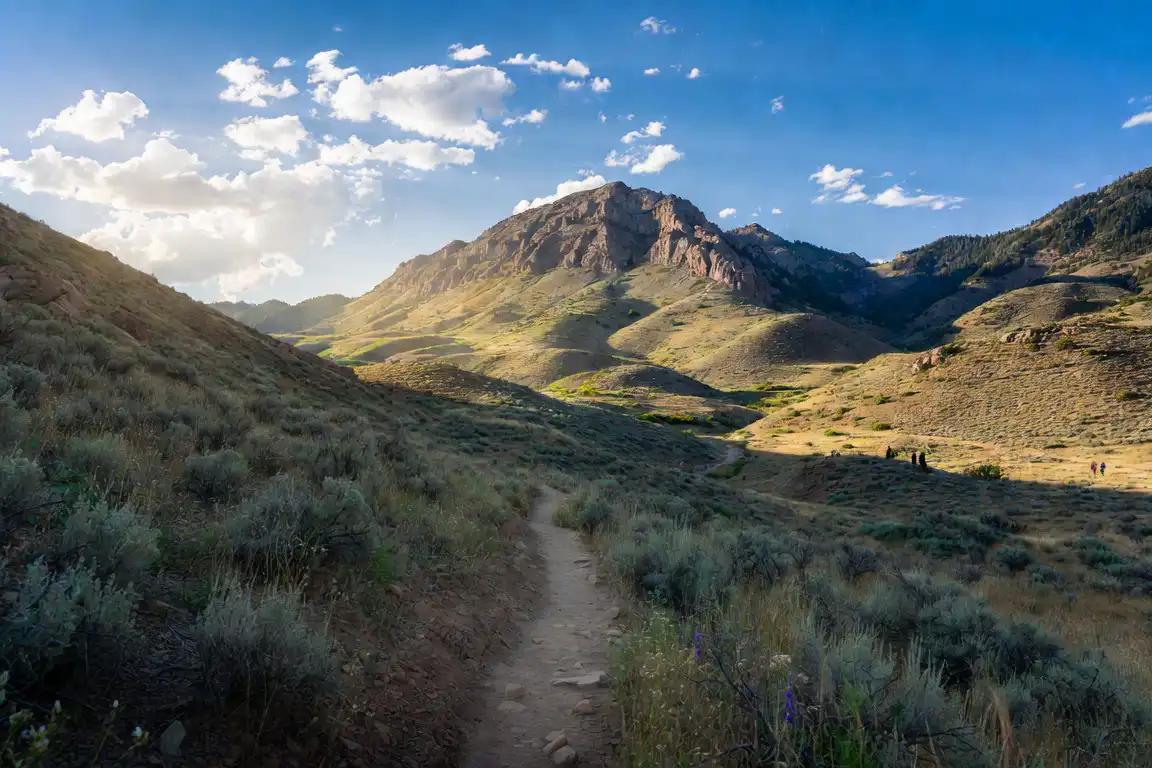 Mountain hiking trail through the scenic landscape at Smuggler’s Gap Trail in Salt Lake City, Utah.